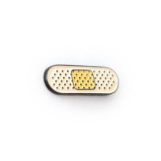 Small bandaid with dotted texture.