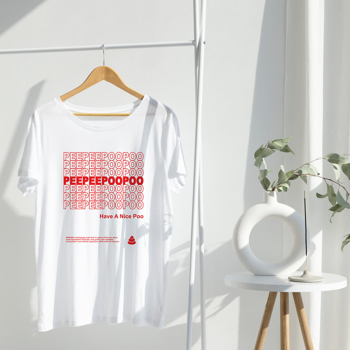 White tshirt with text "peepee poopoo" and "have a nice poo" in red takeout container style.