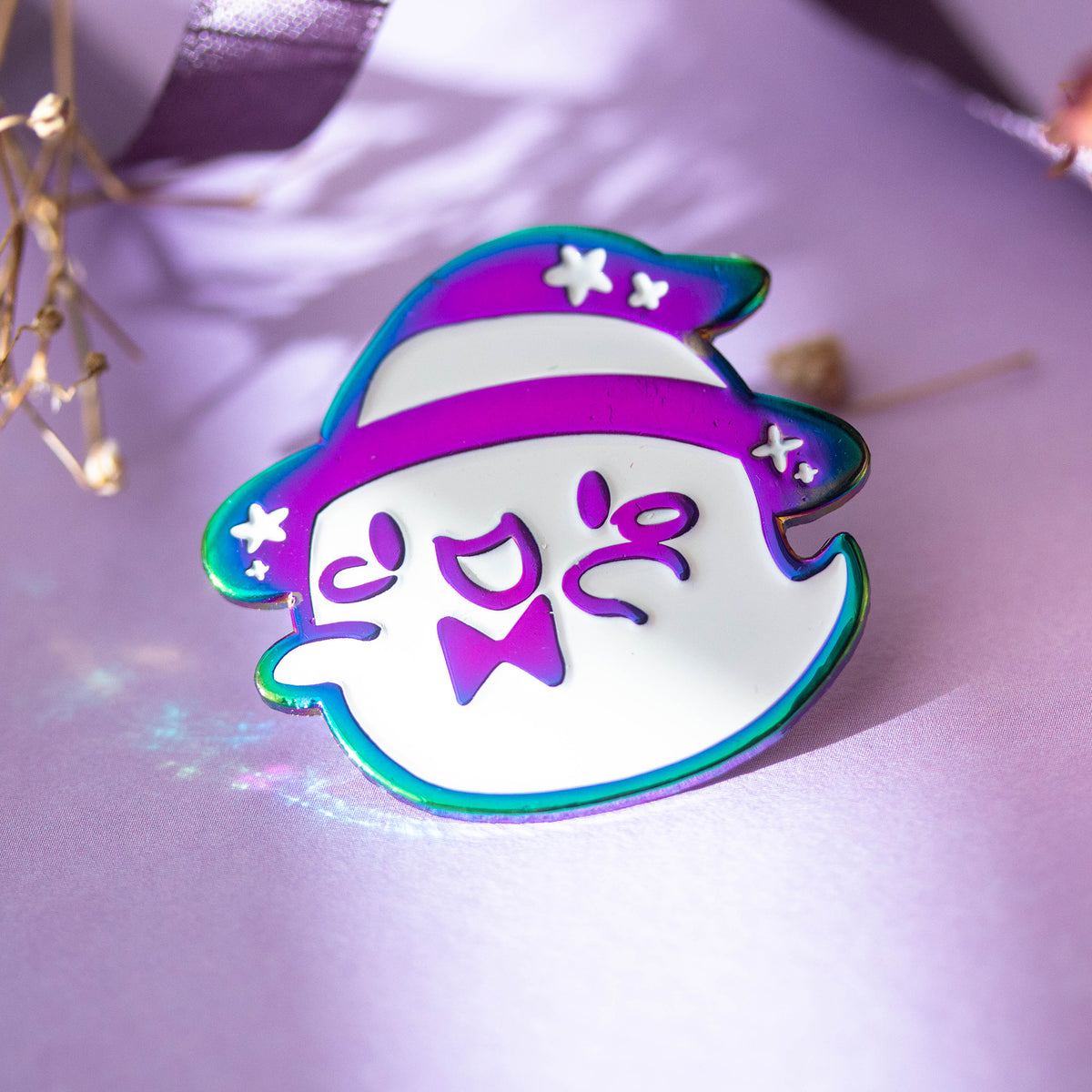 Iridescent ghost with witch hat and bowtie.